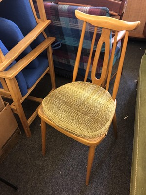 Lot 119 - An Ercol dining table and chairs