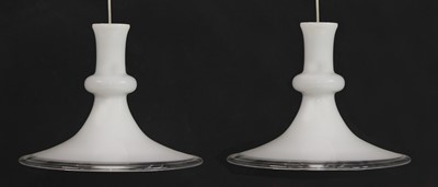 Lot 551 - A pair of Holmegaard glass pendant lights