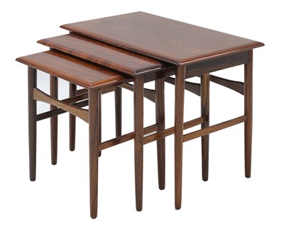 Lot 324 - A nest of rosewood coffee tables