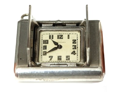 Lot 343 - An Art Deco Swiss sterling silver purse watch, c.1929