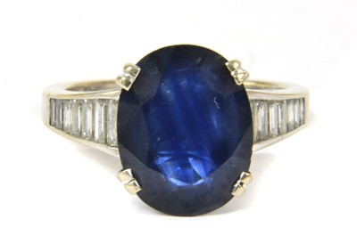Lot 61 - A French white gold sapphire and diamond ring