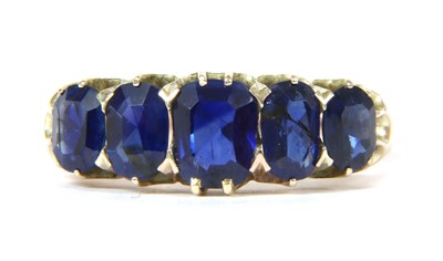 Lot 35 - A gold sapphire five stone ring
