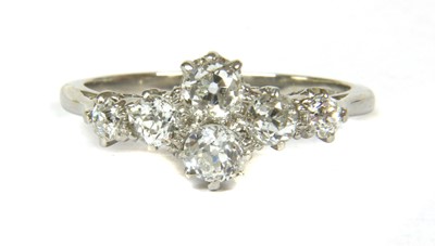 Lot 37 - A platinum diamond quatrefoil cluster ring