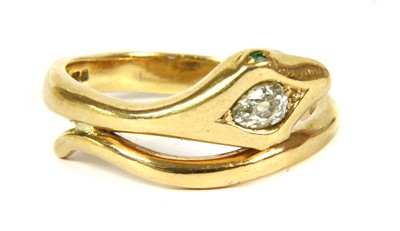 Lot 44 - An 18ct gold diamond and emerald snake ring