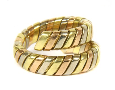 Lot 56 - A Bulgari 18ct tri-colour gold Tubogas ring