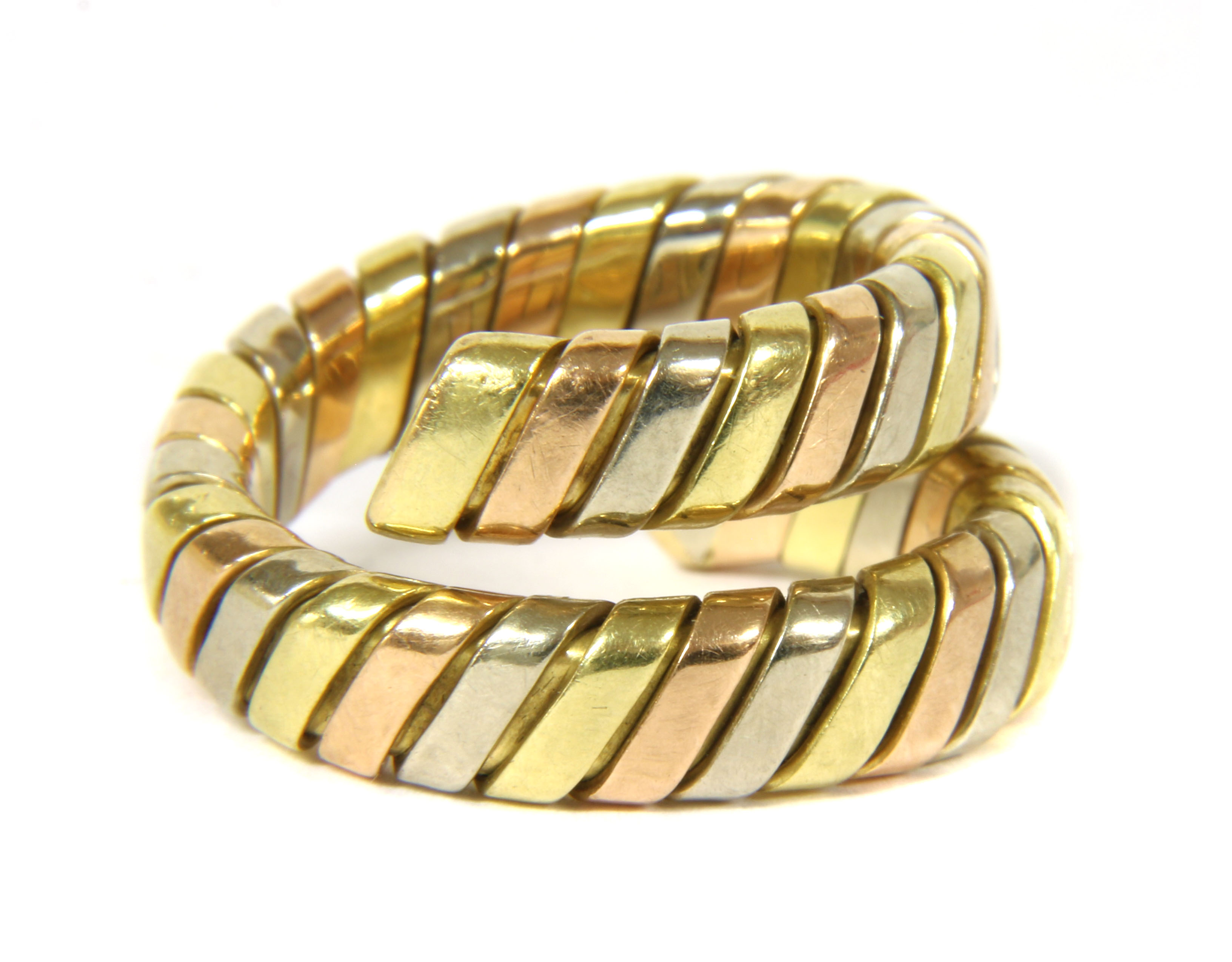 Lot 56 - A Bulgari 18ct tri-colour gold Tubogas ring,