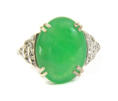 Lot 53 - A white gold jade and diamond ring