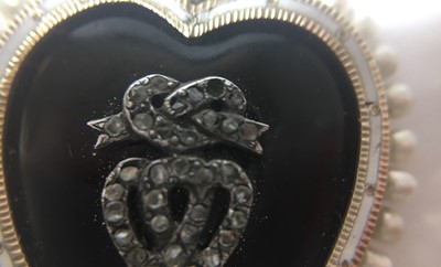 Lot 10 - A Victorian gold onyx, diamond, enamel and seed pearl heart pendant