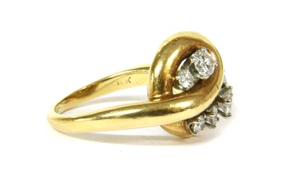 Lot 55 - A gold diamond dress ring