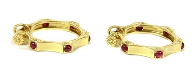 Lot 52 - A pair of Cartier gold ruby hoop earrings