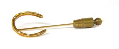 Lot 17 - A Tiffany & Co. gold diamond horseshoe stick pin