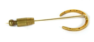 Lot 17 - A Tiffany & Co. gold diamond horseshoe stick pin