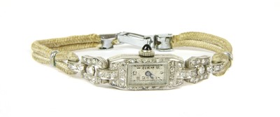 Lot 33 - An Art Deco platinum diamond cocktail watch, c.1925