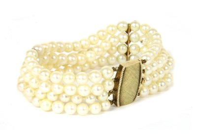 Lot 73 - A gold four row uniform cultured pearl bracelet
