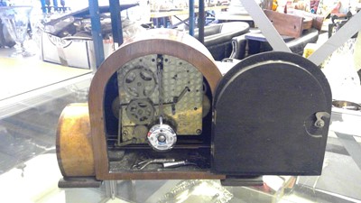 Lot 112 - An Art Deco walnut mantel clock