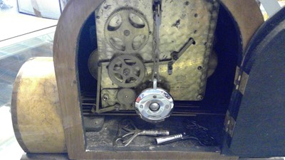 Lot 112 - An Art Deco walnut mantel clock