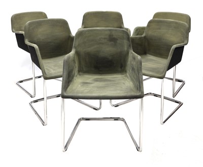 Lot 504 - A set of six moulded cantilever armchairs