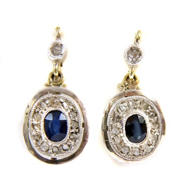 Lot 63 - A pair of gold and silver, sapphire and diamond cluster earrings