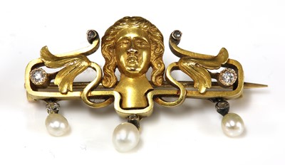 Lot 38 - An Art Nouveau Continental pearl and diamond bar brooch
