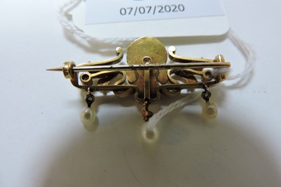 Lot 38 - An Art Nouveau Continental pearl and diamond bar brooch