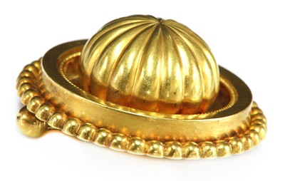 Lot 46 - A Victorian Etruscan Revival gold shield form brooch, c.1870
