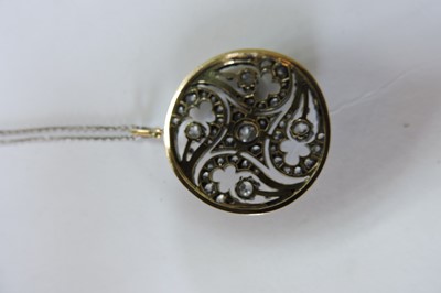 Lot 64 - A Victorian diamond set circular pendant
