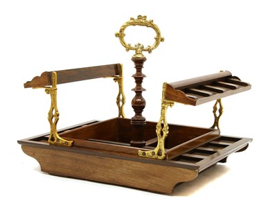 Lot 138 - A 19th century rosewood sewing stand, with gilt brass mounts