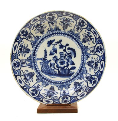 Lot 109 - A 19th century blue and white tin glazed charger