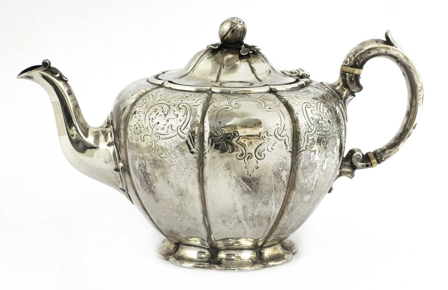 Lot 59 - A Victorian silver melon-shaped teapot