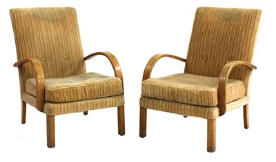 Lot 573 - A pair of Parker Knoll oak armchairs
