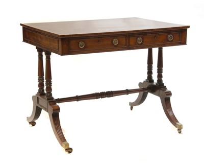 Lot 639 - A Regency mahogany and rosewood banded library table