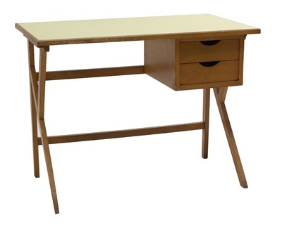 Lot 124 - A small beech desk