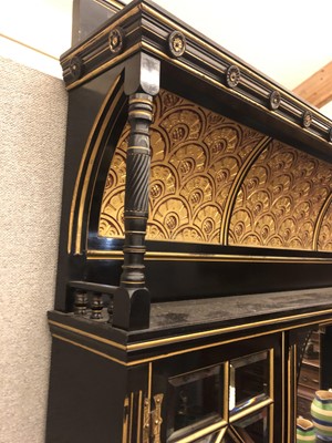 Lot 27 - An Aesthetic ebonised and gilt wall cabinet