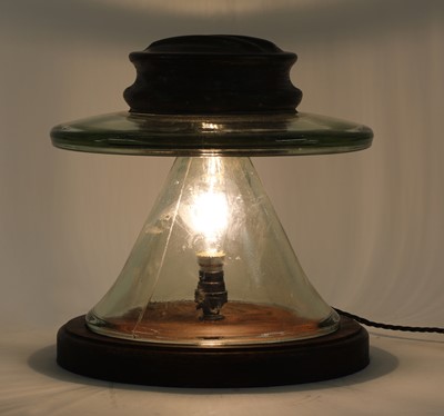 Lot 543 - A glass 'insulator' table lamp