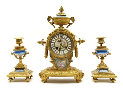 Lot 117 - A Sevres style porcelain and gilt bronze mounted clock garniture