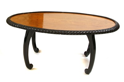 Lot 203 - A Ceylonese ebony and satinwood oval table