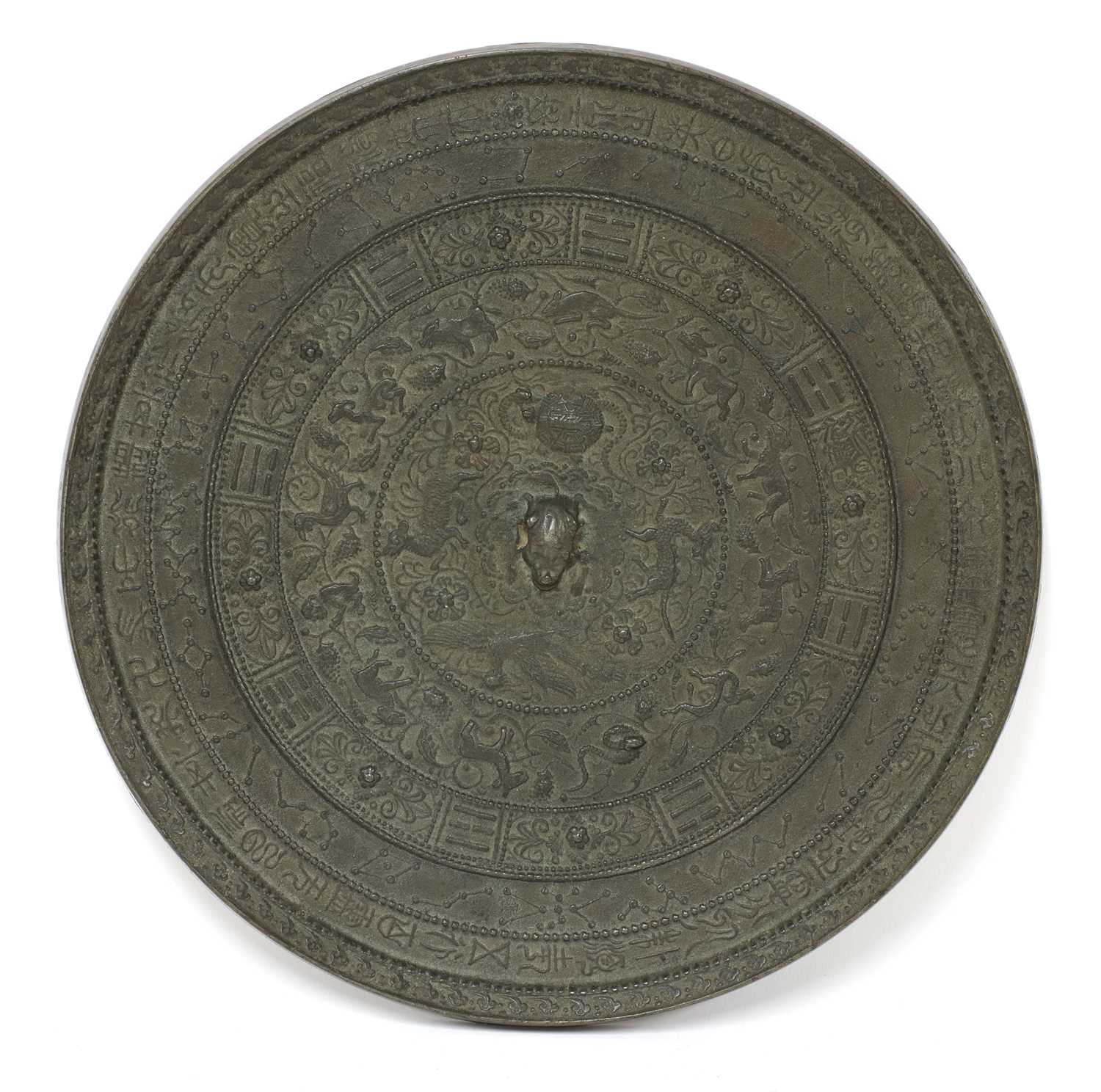 Lot 211 - A Chinese bronze mirror