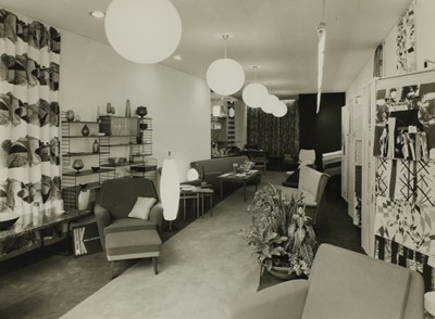 Lot 345 - Twenty-three photographs of the interior of Oscar Woollens shop