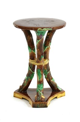 Lot 327 - A Victorian majolica jardinière stand