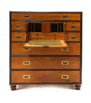 Lot 194 - A camphor and ebony secretaire campaign chest of drawers
