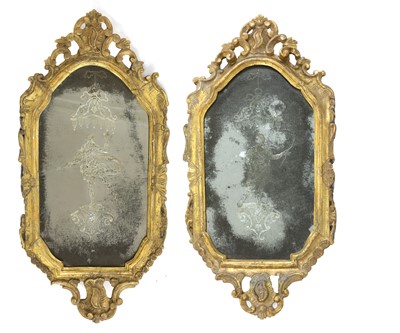 Lot 686 - A pair of Venetian giltwood girandole wall mirrors