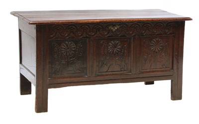 Lot 677 - An oak coffer