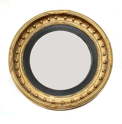 Lot 540 - A Regency gilt convex mirror