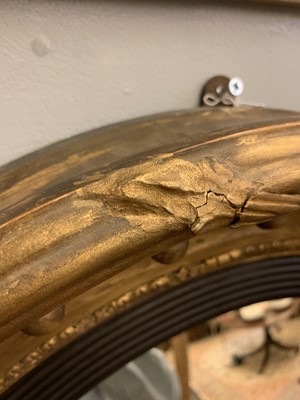Lot 540 - A Regency gilt convex mirror
