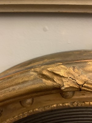 Lot 540 - A Regency gilt convex mirror