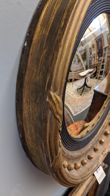 Lot 540 - A Regency gilt convex mirror