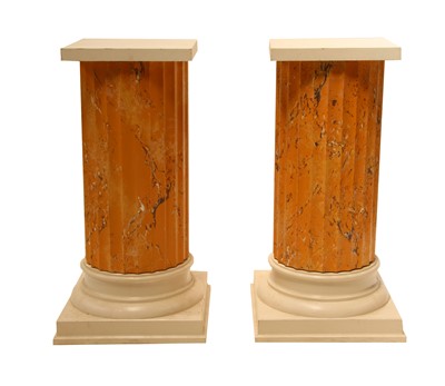 Lot 636 - A pair of composite faux marble fluted columns