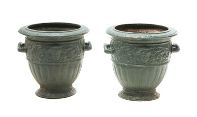 Lot 292 - A pair of green painted cast iron urns