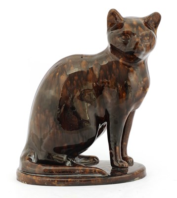 Lot 102 - A treacle glazed cat