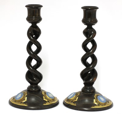 Lot 526 - A pair of open twist candlesticks